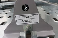 Radstopper Sicherungsbock verstellbar grau für Lohr Lochblech VDI 2700