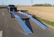 trailershop.de Brian James A4 Transporter 500x200cm blackline Alufelgen silber Rampen 240cm Reifenregal 3000kg J